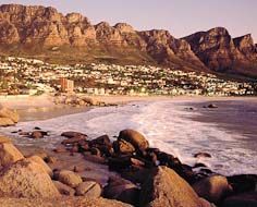 Camps Bay beach is one of Cape Town's top destinations for families and couples alike. The Twelve Apostles buttresses, part of the Table Mountain range forms a majestic backdrop.