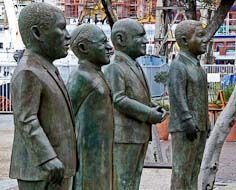 Group of statues in Cape Town's V&A Waterfront depicting four Nobel Peace Prize Laureates - Luthili, Tutu, De Klerk & Mandela.